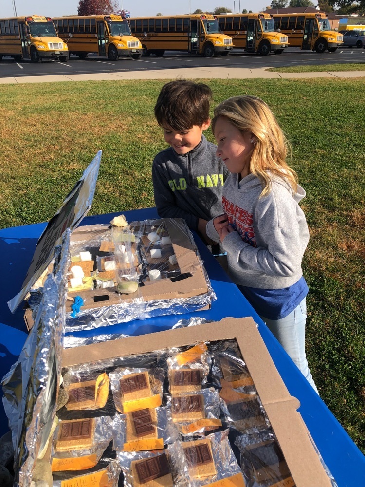 Here students are checking on the s’mores. They weren’t quite finished baking in the sun. 